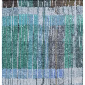 Photo of Teal Blue Brown And Ivory Striped Washable Indoor Outdoor Area Rug