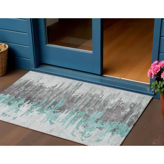 Teal Blue Charcoal And Silver Abstract Washable Indoor Outdoor Area Rug Photo 1