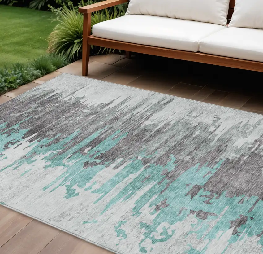 Teal Blue Charcoal And Silver Abstract Washable Indoor Outdoor Area Rug Photo 1