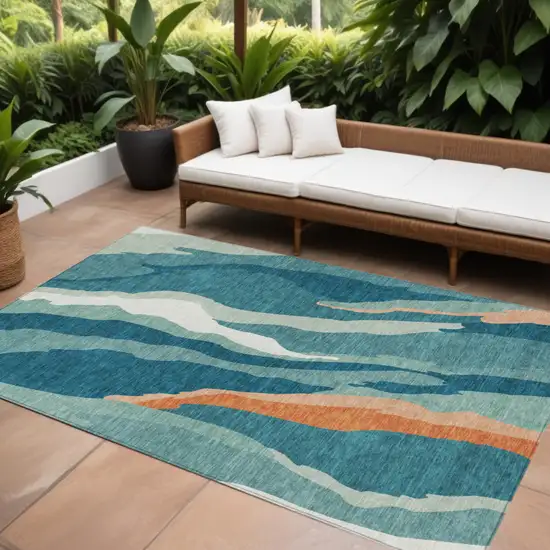 Teal Blue Copper And Ivory Abstract Washable Indoor Outdoor Area Rug Photo 1