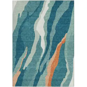 Photo of Teal Blue Copper And Ivory Abstract Washable Indoor Outdoor Area Rug