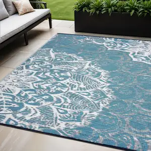Photo of Teal Blue Floral Indoor Outdoor Area Rug