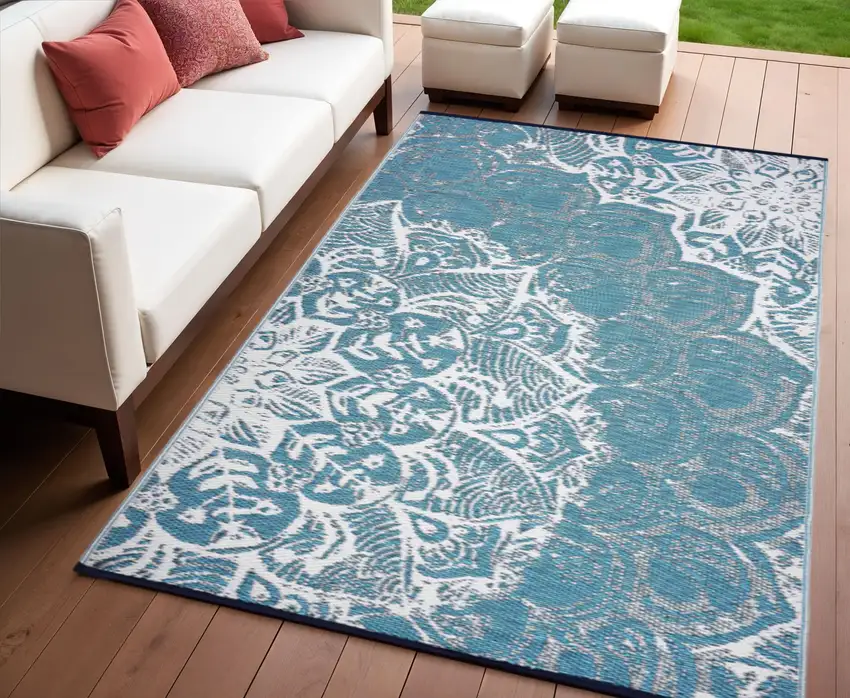 Teal Blue Floral Machine Braided Distressed Area Rug With UV Protection Photo 1