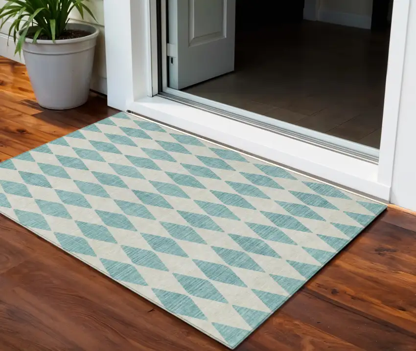 Teal Blue And Ivory Geometric Washable Indoor Outdoor Area Rug Photo 1