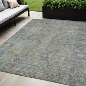 Photo of Teal Blue Gold And Beige Oriental Washable Indoor Outdoor Area Rug