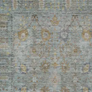 Photo of Teal Blue Gold And Beige Oriental Washable Indoor Outdoor Area Rug
