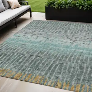 Photo of Teal Blue Gold And Gray Abstract Washable Indoor Outdoor Area Rug