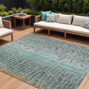 Photo of Teal Blue Gold And Gray Abstract Washable Indoor Outdoor Area Rug