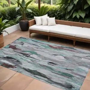 Photo of Teal Blue Gray And Brown Abstract Washable Indoor Outdoor Area Rug