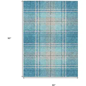 Photo of Teal Blue Gray And Brown Plaid Washable Indoor Outdoor Area Rug