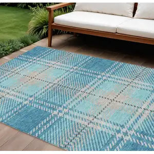 Photo of Teal Blue Gray And Brown Plaid Washable Indoor Outdoor Area Rug
