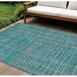 Photo of Teal Blue Gray And Brown Striped Washable Indoor Outdoor Area Rug