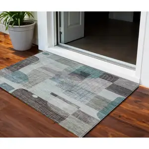 Photo of Teal Blue Gray And Charcoal Abstract Washable Indoor Outdoor Area Rug