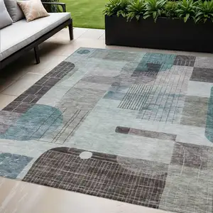 Photo of Teal Blue Gray And Charcoal Abstract Washable Indoor Outdoor Area Rug