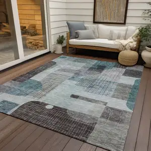 Photo of Teal Blue Gray And Charcoal Abstract Washable Indoor Outdoor Area Rug