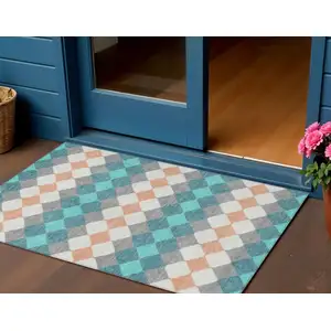 Photo of Teal Blue Gray And Copper Geometric Washable Indoor Outdoor Area Rug