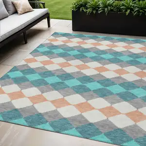 Photo of Teal Blue Gray And Copper Geometric Washable Indoor Outdoor Area Rug