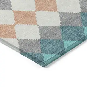 Photo of Teal Blue Gray And Copper Geometric Washable Indoor Outdoor Area Rug
