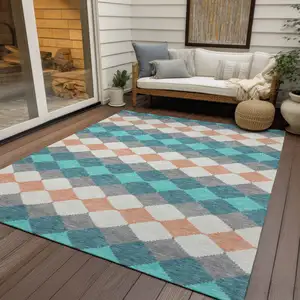 Photo of Teal Blue Gray And Copper Geometric Washable Indoor Outdoor Area Rug