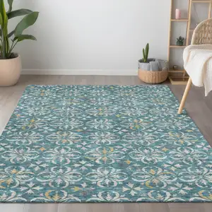 Photo of Teal Blue Gray And Gold Floral Washable Indoor Outdoor Area Rug