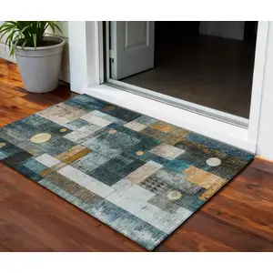 Photo of Teal Blue Gray And Gold Geometric Washable Indoor Outdoor Area Rug