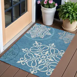 Photo of Teal Blue Gray And Ivory Floral Medallion Washable Indoor Outdoor Area Rug