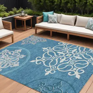 Photo of Teal Blue Gray And Ivory Floral Medallion Washable Indoor Outdoor Area Rug
