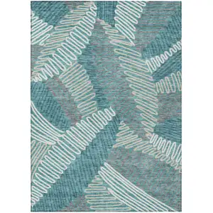 Photo of Teal Blue Gray And Ivory Floral Washable Indoor Outdoor Area Rug