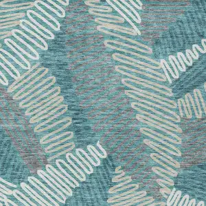 Photo of Teal Blue Gray And Ivory Floral Washable Indoor Outdoor Area Rug