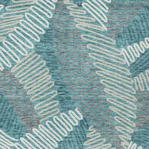 Photo of Teal Blue Gray And Ivory Floral Washable Indoor Outdoor Area Rug