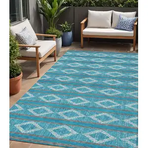 Photo of Teal Blue Gray And Ivory Geometric Washable Indoor Outdoor Area Rug