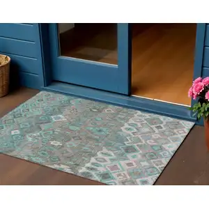 Photo of Teal Blue Gray And Ivory Geometric Washable Indoor Outdoor Area Rug