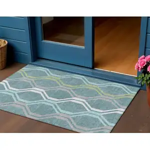Photo of Teal Blue Gray And Ivory Geometric Washable Indoor Outdoor Area Rug