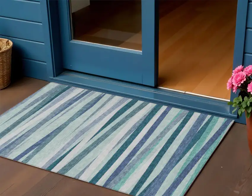 Teal Blue Gray And Ivory Striped Washable Indoor Outdoor Area Rug Photo 1