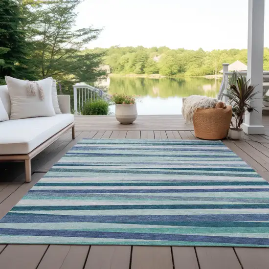 Teal Blue Gray And Ivory Striped Washable Indoor Outdoor Area Rug Photo 9
