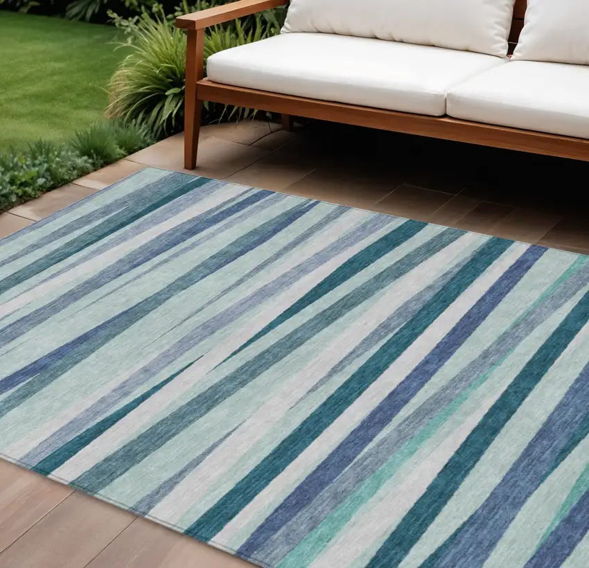 Teal Blue Gray And Ivory Striped Washable Indoor Outdoor Area Rug Photo 1