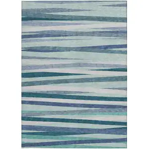 Photo of Teal Blue Gray And Ivory Striped Washable Indoor Outdoor Area Rug