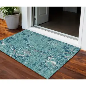 Photo of Teal Blue Gray And Ivory Striped Washable Indoor Outdoor Area Rug