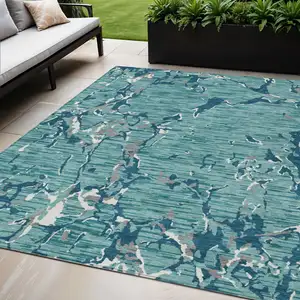 Photo of Teal Blue Gray And Ivory Striped Washable Indoor Outdoor Area Rug