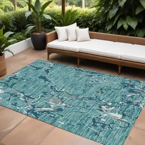 Photo of Teal Blue Gray And Ivory Striped Washable Indoor Outdoor Area Rug