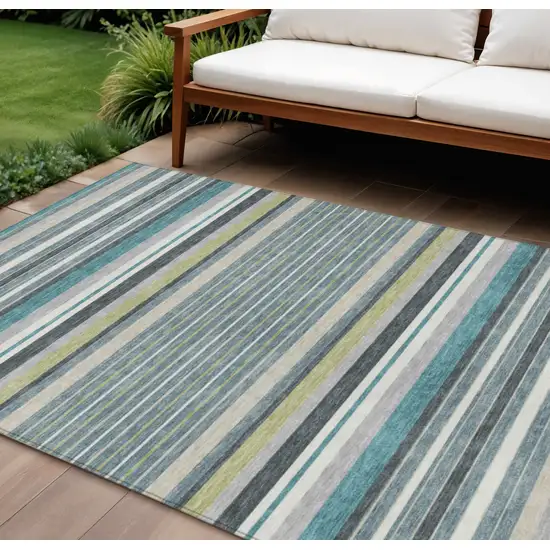 Teal Blue Gray And Ivory Striped Washable Indoor Outdoor Area Rug Photo 1
