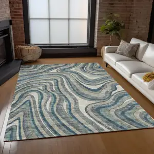 Photo of Teal Blue Gray And Taupe Abstract Washable Indoor Outdoor Area Rug