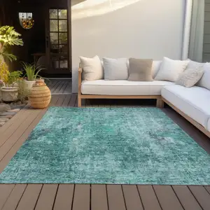 Photo of Teal Blue Green And Gray Abstract Washable Indoor Outdoor Area Rug