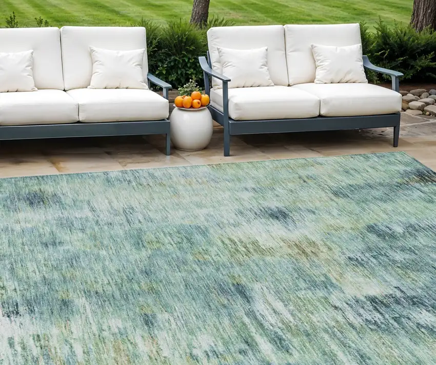 Teal Blue Green And Ivory Abstract Washable Indoor Outdoor Area Rug Photo 1