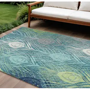 Photo of Teal Blue Green And Ivory Floral Washable Indoor Outdoor Area Rug