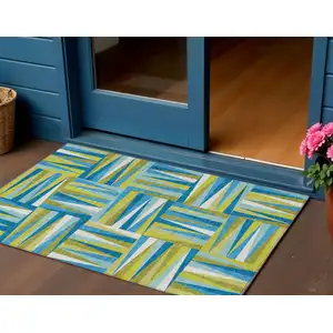 Photo of Teal Blue Green And Ivory Geometric Washable Indoor Outdoor Area Rug