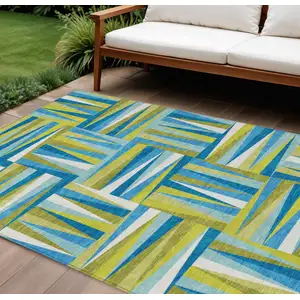 Photo of Teal Blue Green And Ivory Geometric Washable Indoor Outdoor Area Rug