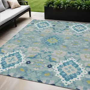 Photo of Teal Blue Green And Ivory Oriental Washable Indoor Outdoor Area Rug