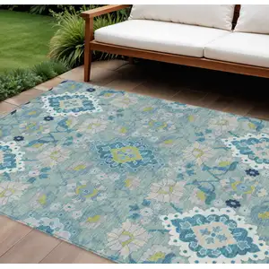 Photo of Teal Blue Green And Ivory Oriental Washable Indoor Outdoor Area Rug