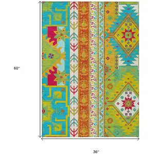 Photo of Teal Blue Green And Pink Aztec Washable Indoor Outdoor Area Rug